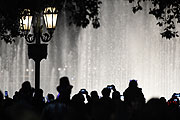 Revelers watch the Bellagio fountain display during New Year's Eve celebration on the Las Vegas Strip Thursday, Dec. 31, 2015. CREDIT: Sam Morris/Las Vegas News Bureau